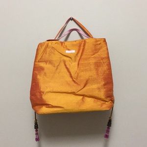 Brand new! Trina Iridescent Raw Silk Purse